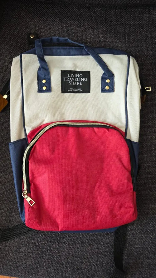 Photo du sac à dos à langer avec poche isotherme biberons