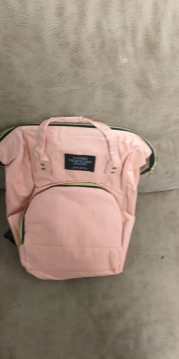 Photo du sac à dos à langer avec poche isotherme biberons