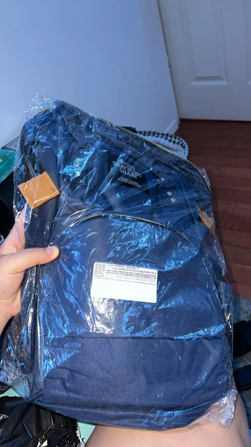 Photo du sac à dos à langer avec poche isotherme biberons
