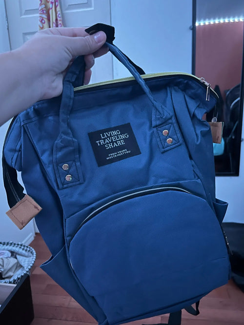Photo du sac à dos à langer avec poche isotherme biberons