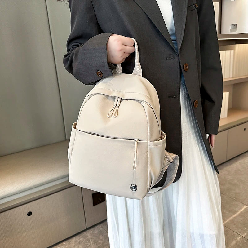 Petit sac à dos femme en nylon à poche avant zippée