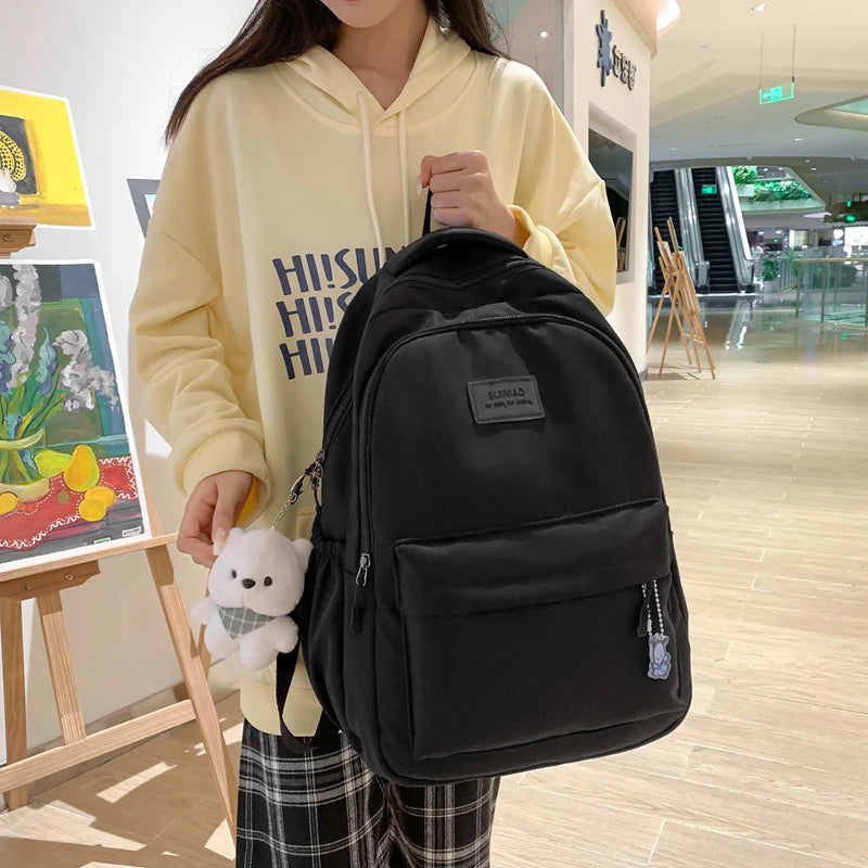 Sac à dos scolaire en nylon avec breloque peluche