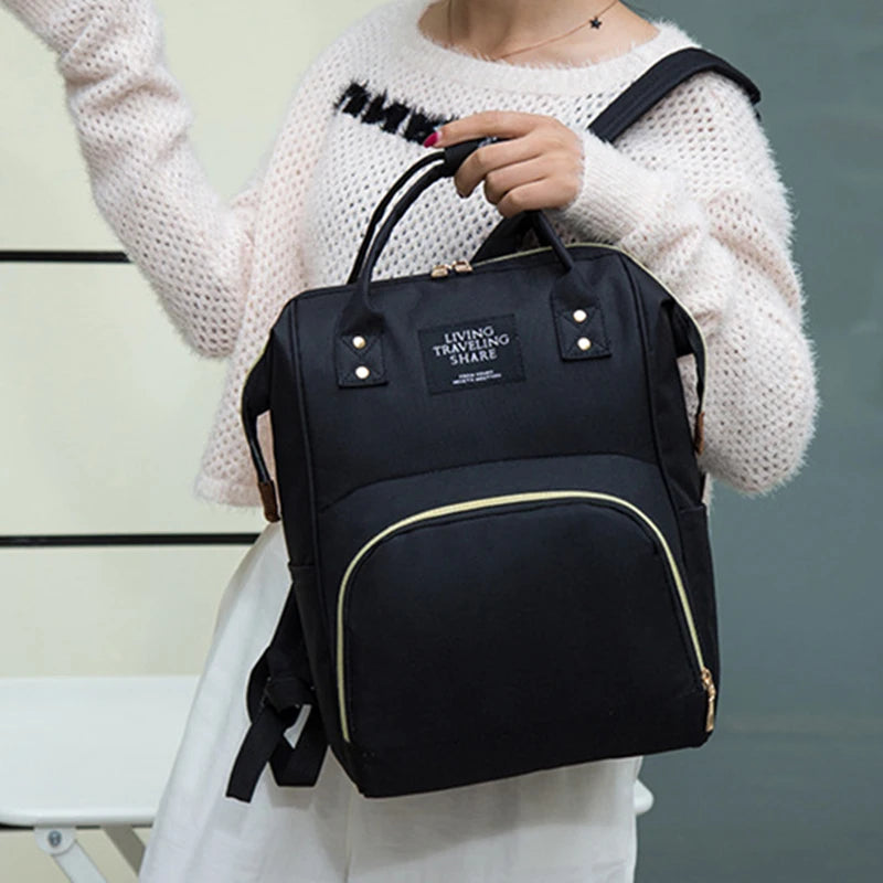 Sac à dos à langer avec poche isotherme biberons