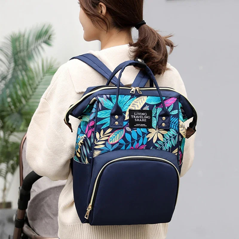 Sac à dos à langer motif feuillage