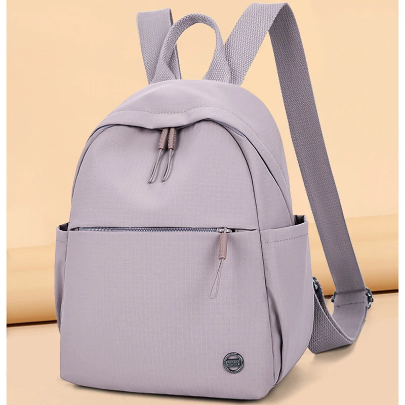 Petit sac à dos femme en nylon à poche avant zippée