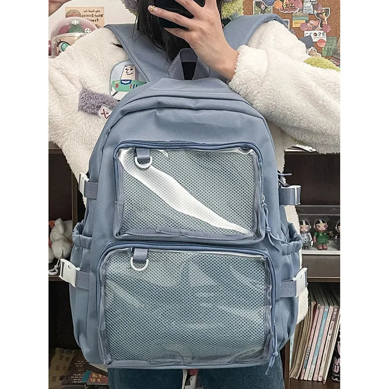 Sac à dos femme à poches frontales transparentes