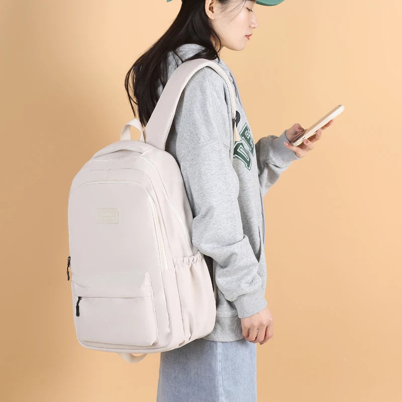 Sac à dos scolaire en nylon avec breloque peluche