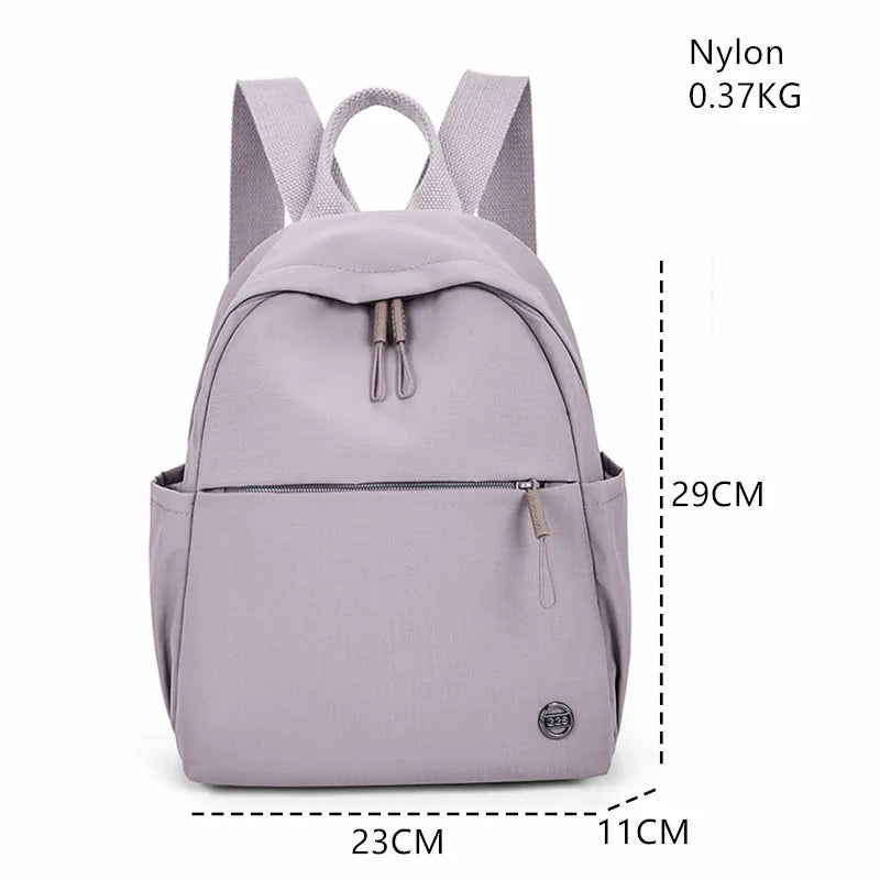 Petit sac à dos femme en nylon à poche avant zippée