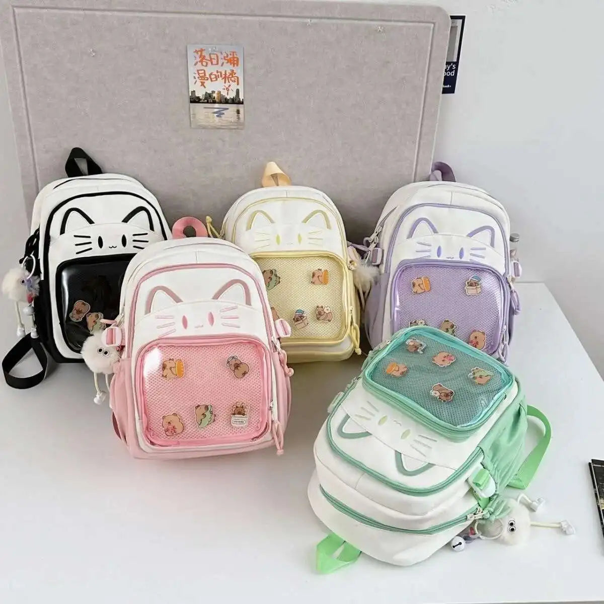 Sac à dos chat avec poche transparente pour pin's