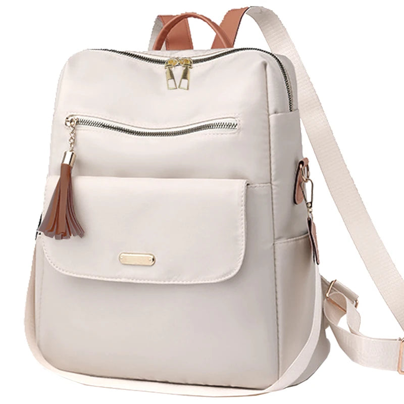 Sac à dos femme en nylon avec pompon amovible