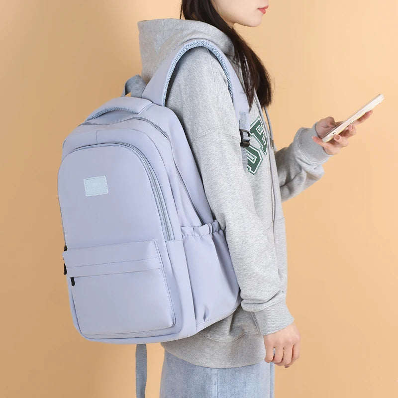 Sac à dos scolaire en nylon avec breloque peluche