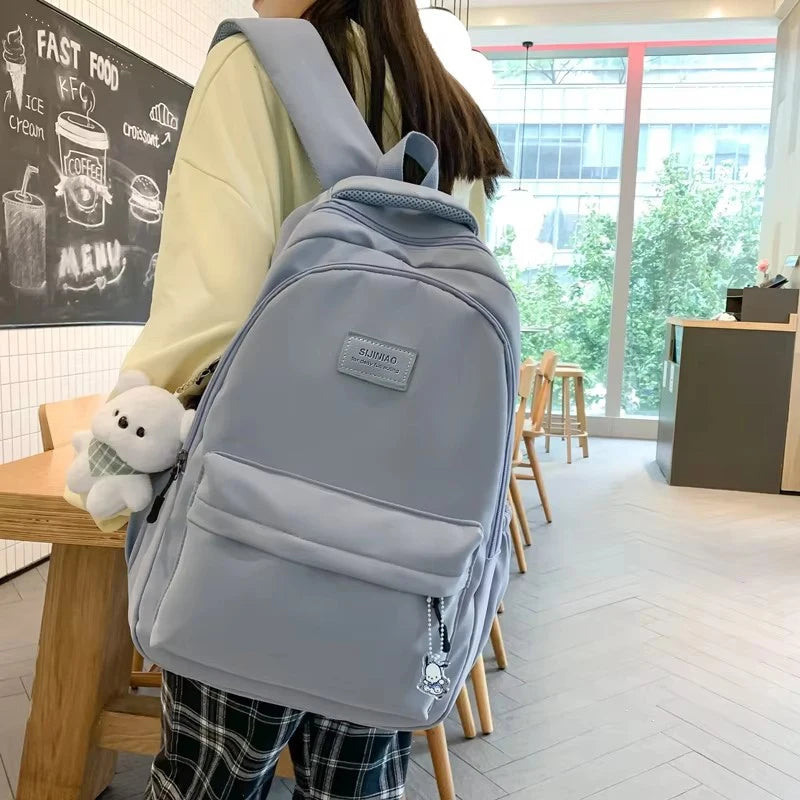 Sac à dos scolaire en nylon avec breloque peluche
