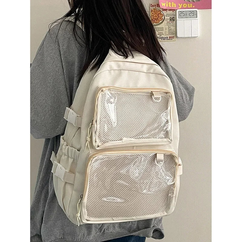 Sac à dos femme à poches frontales transparentes