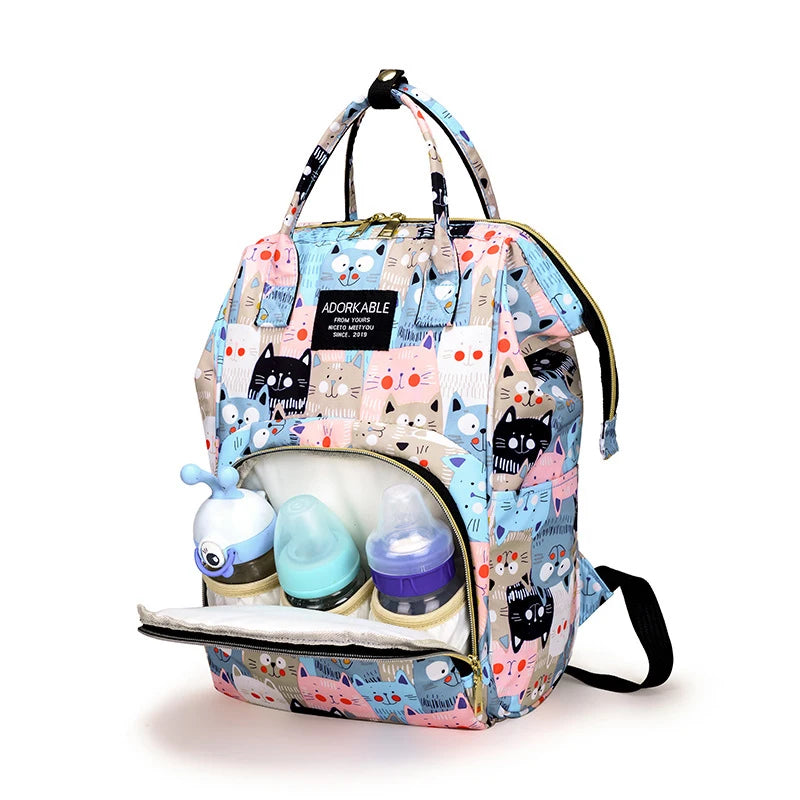 Sac à dos à langer avec poche isotherme biberon