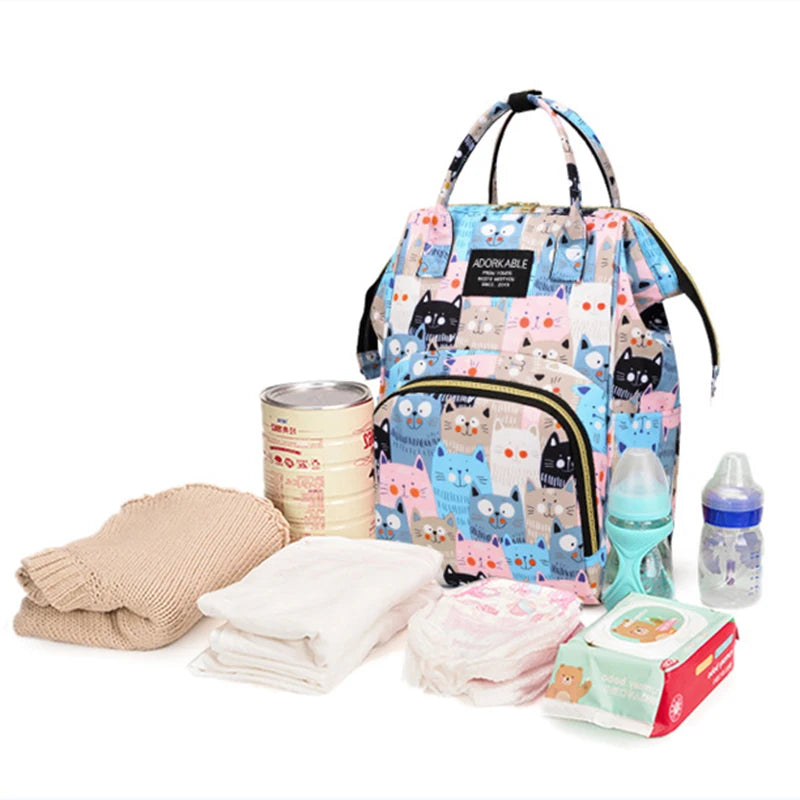 Sac à dos à langer avec poche isotherme biberon