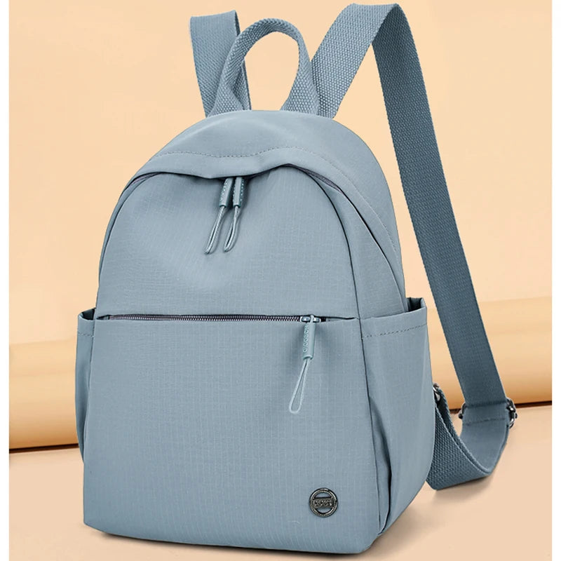 Petit sac à dos femme en nylon à poche avant zippée