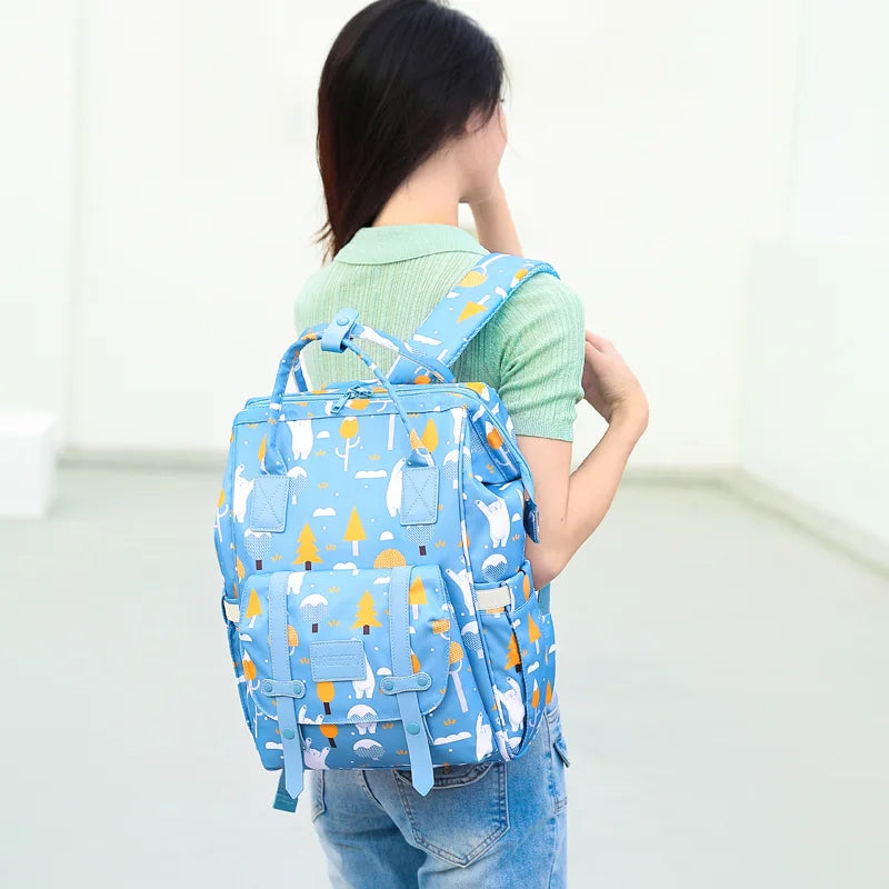 Sac à dos à langer en fibre synthétique