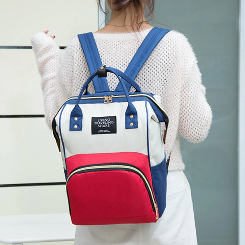 Sac à dos à langer avec poche isotherme biberons