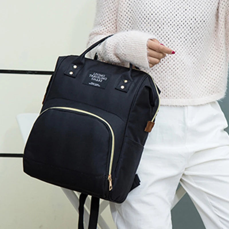 Sac à dos à langer avec poche isotherme biberons