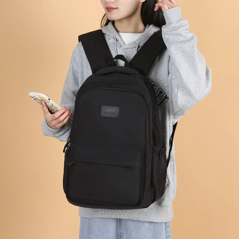 Sac à dos scolaire en nylon avec breloque peluche