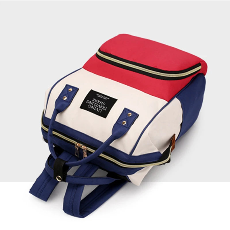 Sac à dos à langer avec poche isotherme biberons
