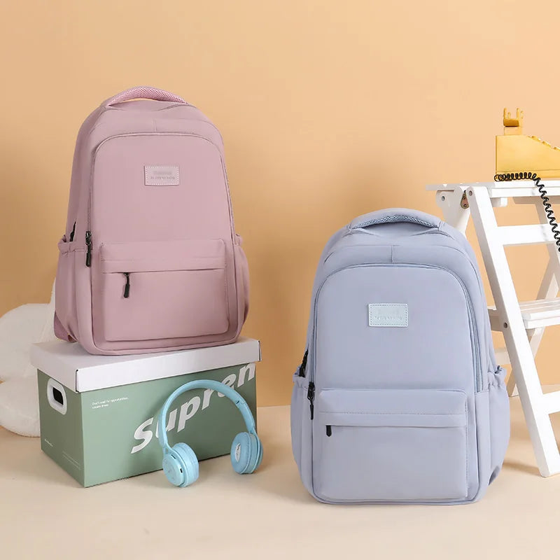 Sac à dos scolaire en nylon avec breloque peluche