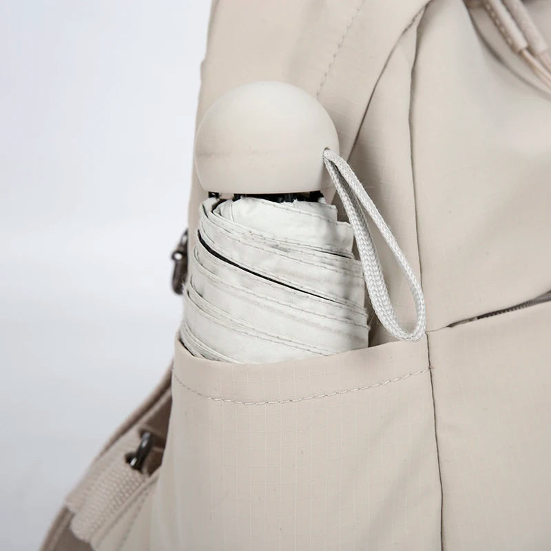 Petit sac à dos femme en nylon à poche avant zippée