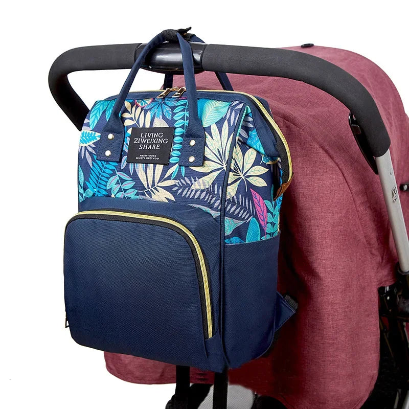 Sac à dos à langer motif feuillage