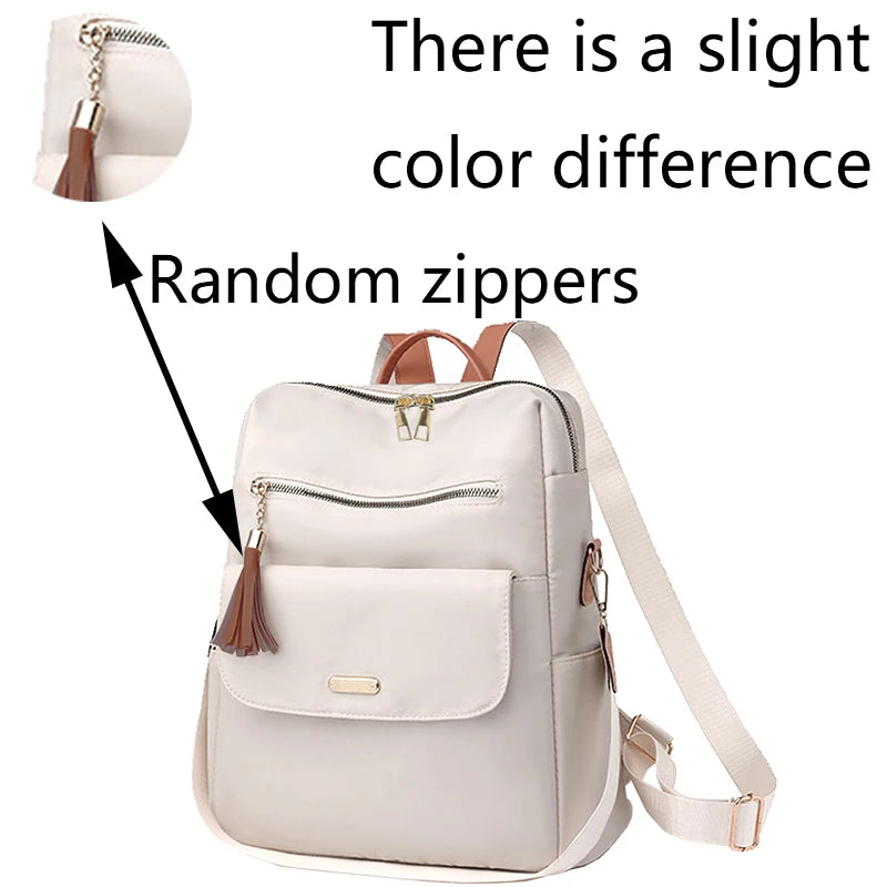 Sac à dos femme en nylon avec pompon amovible