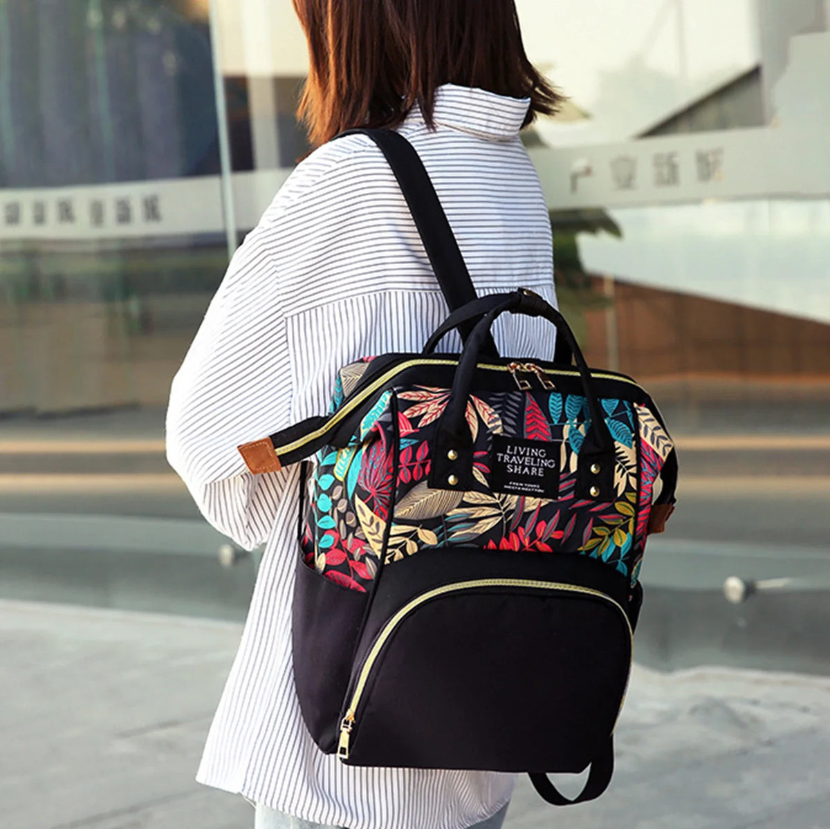 Sac à dos à langer motif feuillage