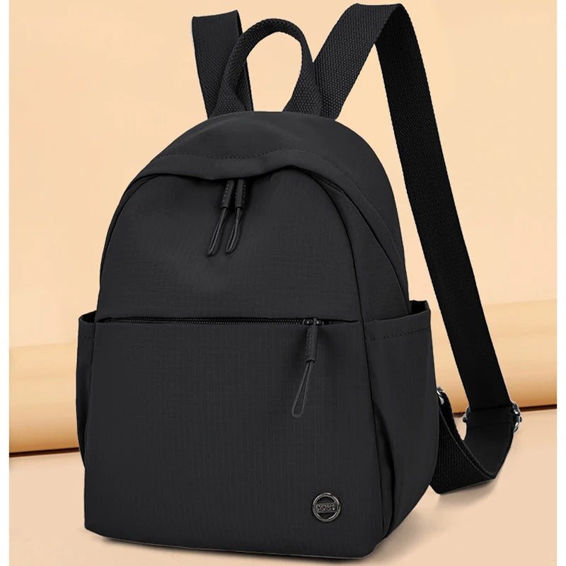 Petit sac à dos femme en nylon à poche avant zippée