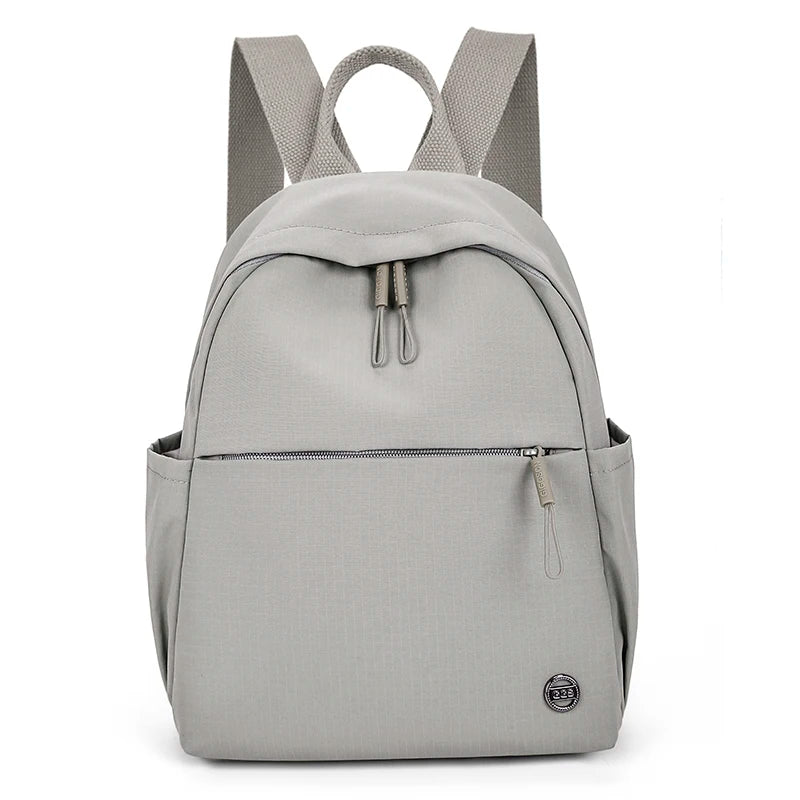 Petit sac à dos femme en nylon à poche avant zippée