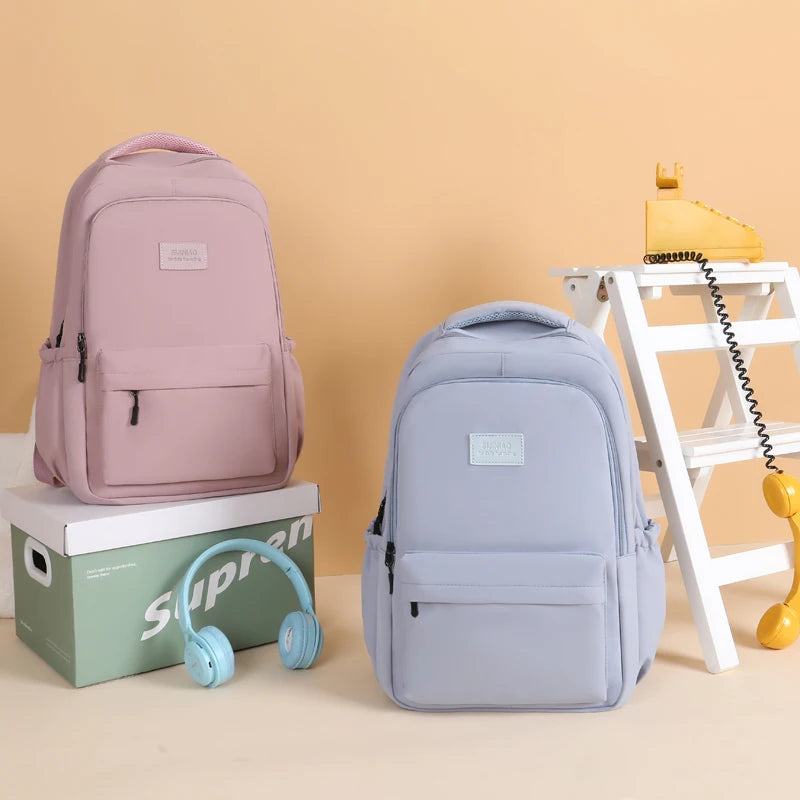 Sac à dos scolaire en nylon avec breloque peluche