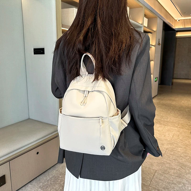 Petit sac à dos femme en nylon à poche avant zippée