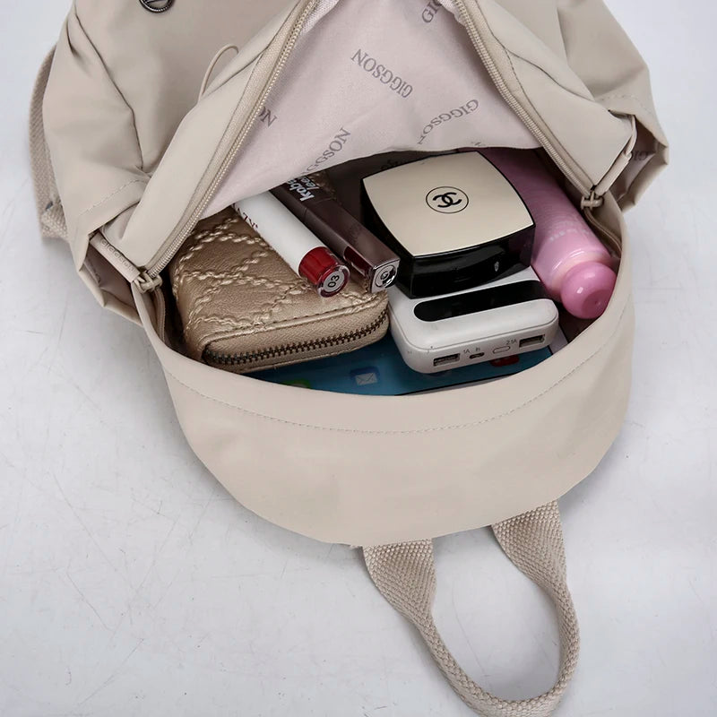 Petit sac à dos femme en nylon à poche avant zippée