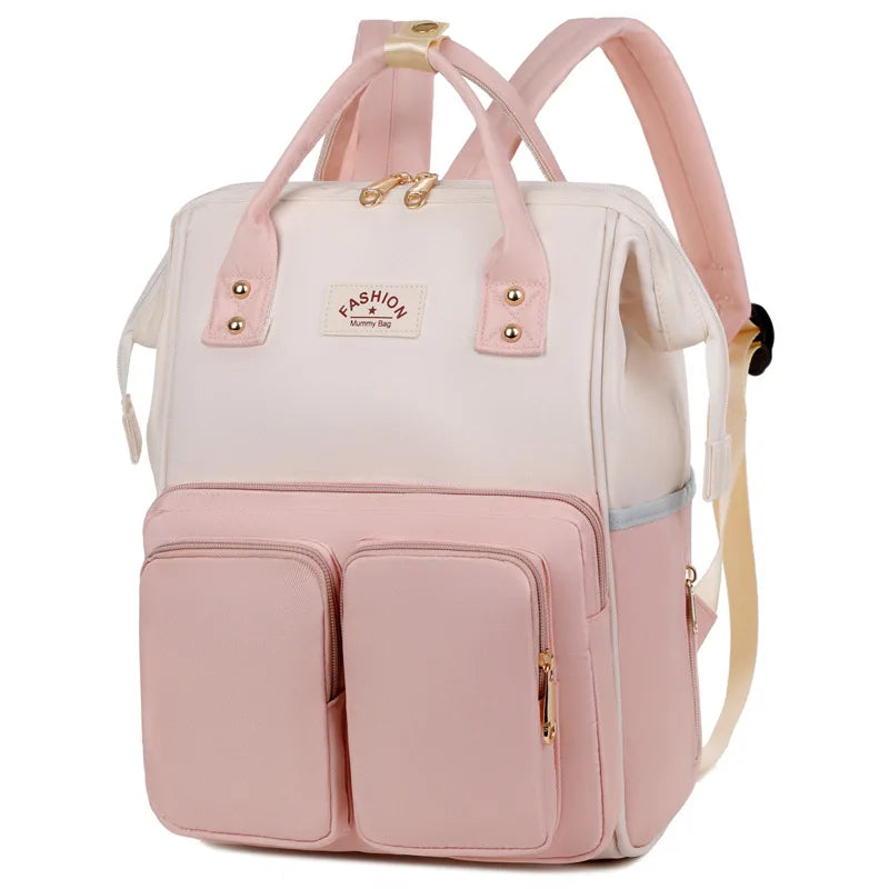 Sac à dos à langer avec anses de portage à la main