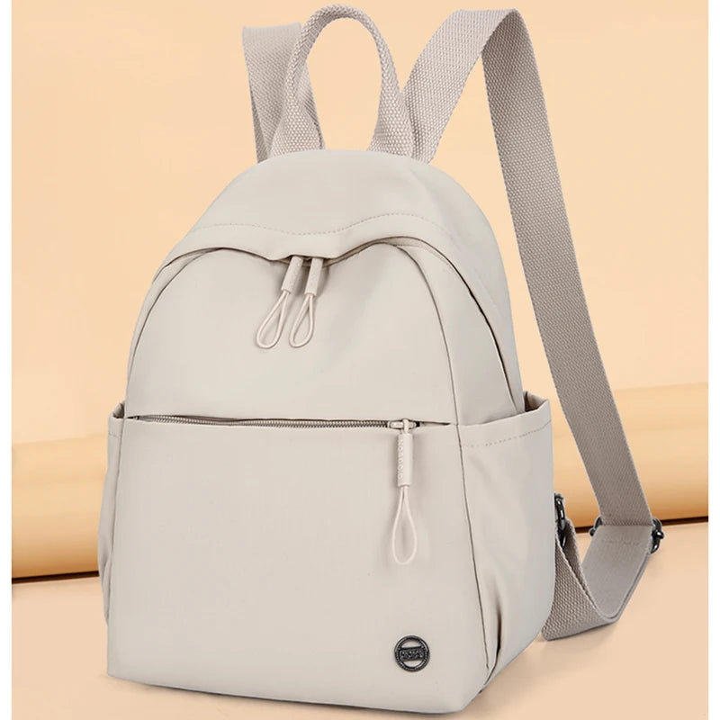 Petit sac à dos femme en nylon à poche avant zippée