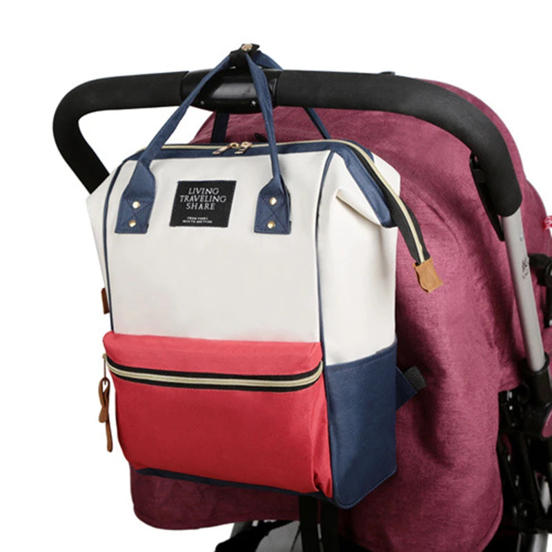 Sac à dos à langer avec poche isotherme biberons
