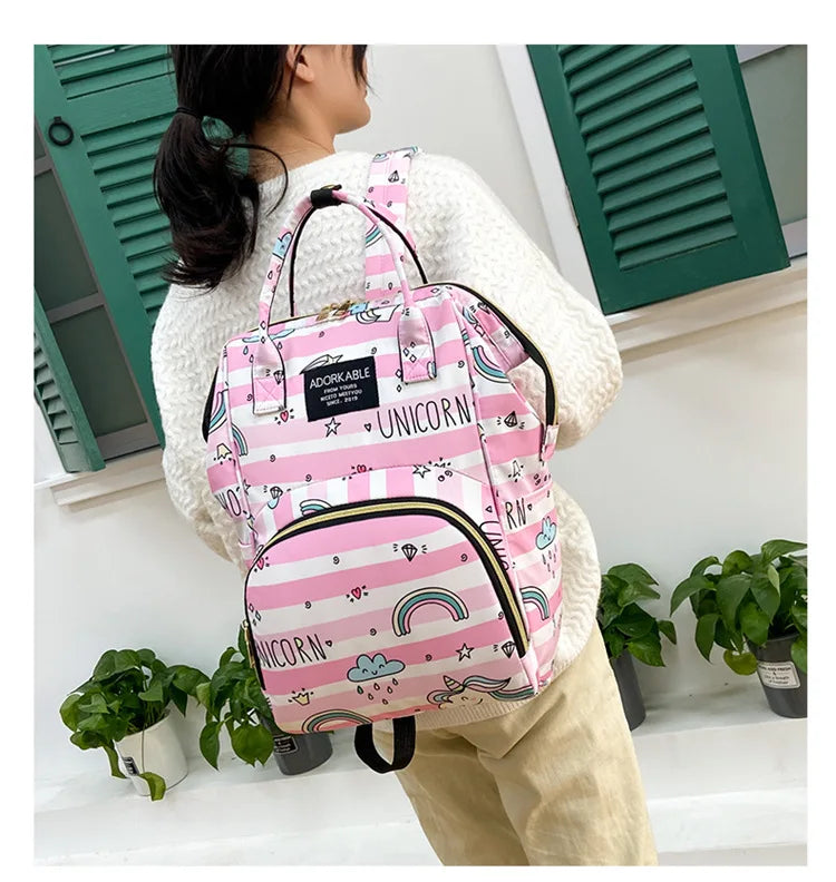 Sac à dos à langer avec poche isotherme biberon