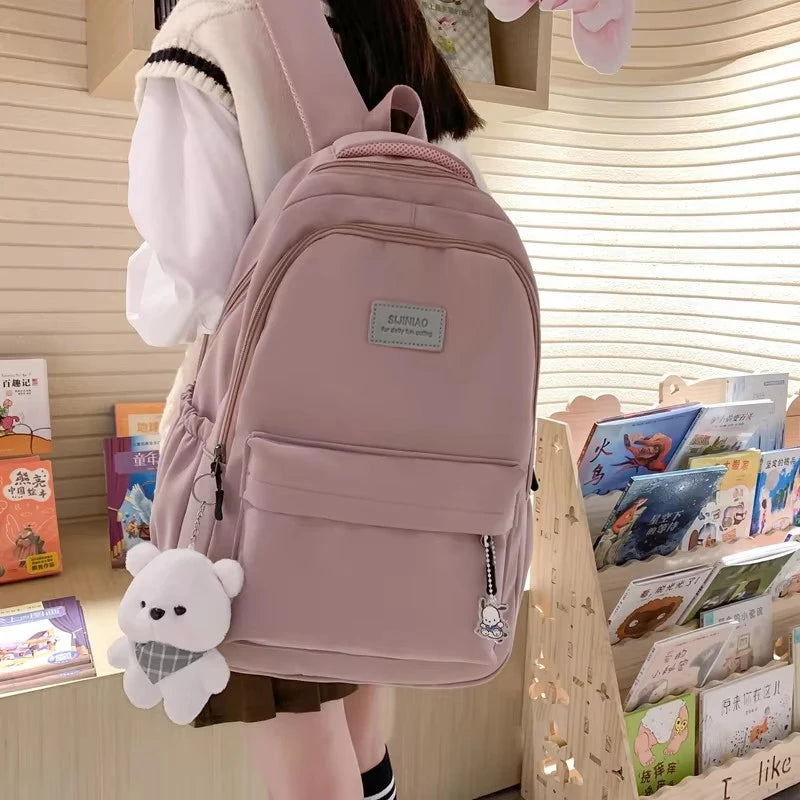 Sac à dos scolaire en nylon avec breloque peluche