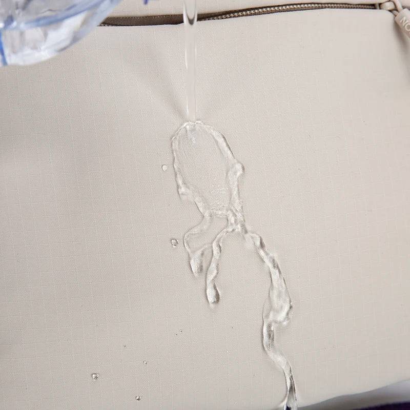 Petit sac à dos femme en nylon à poche avant zippée