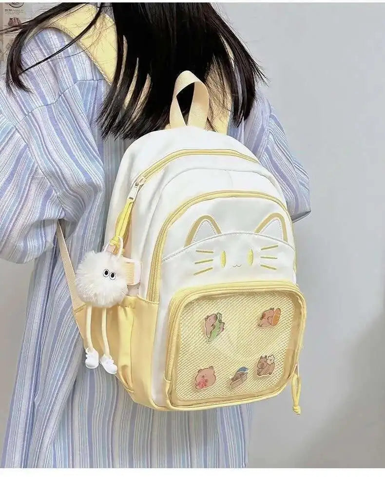 Sac à dos chat avec poche transparente pour pin's