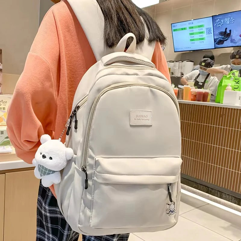 Sac à dos scolaire en nylon avec breloque peluche